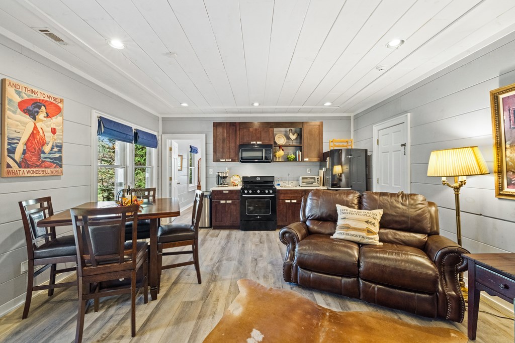 60 Ford Road Dahlonega, GA 30533 - Photo 56 of 59 a living room with furniture and a kitchen view