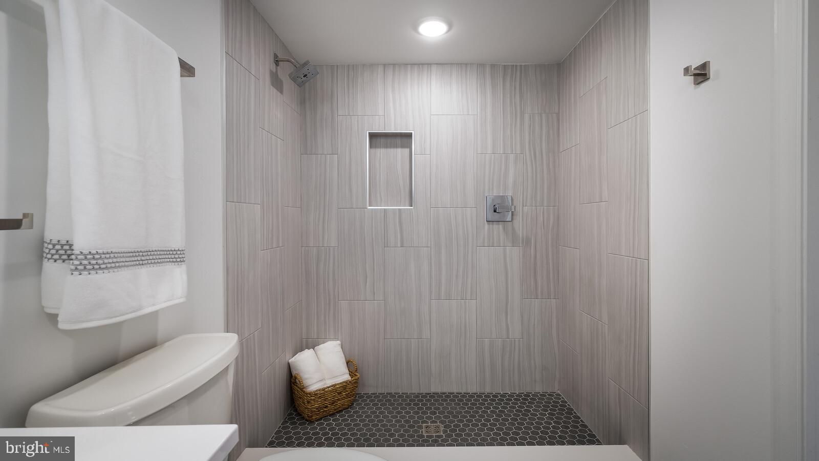 1825 Callowhill Street, Unit 504 Philadelphia, PA 19130 - Photo 25 of 49 a bathroom with a toilet and a shower