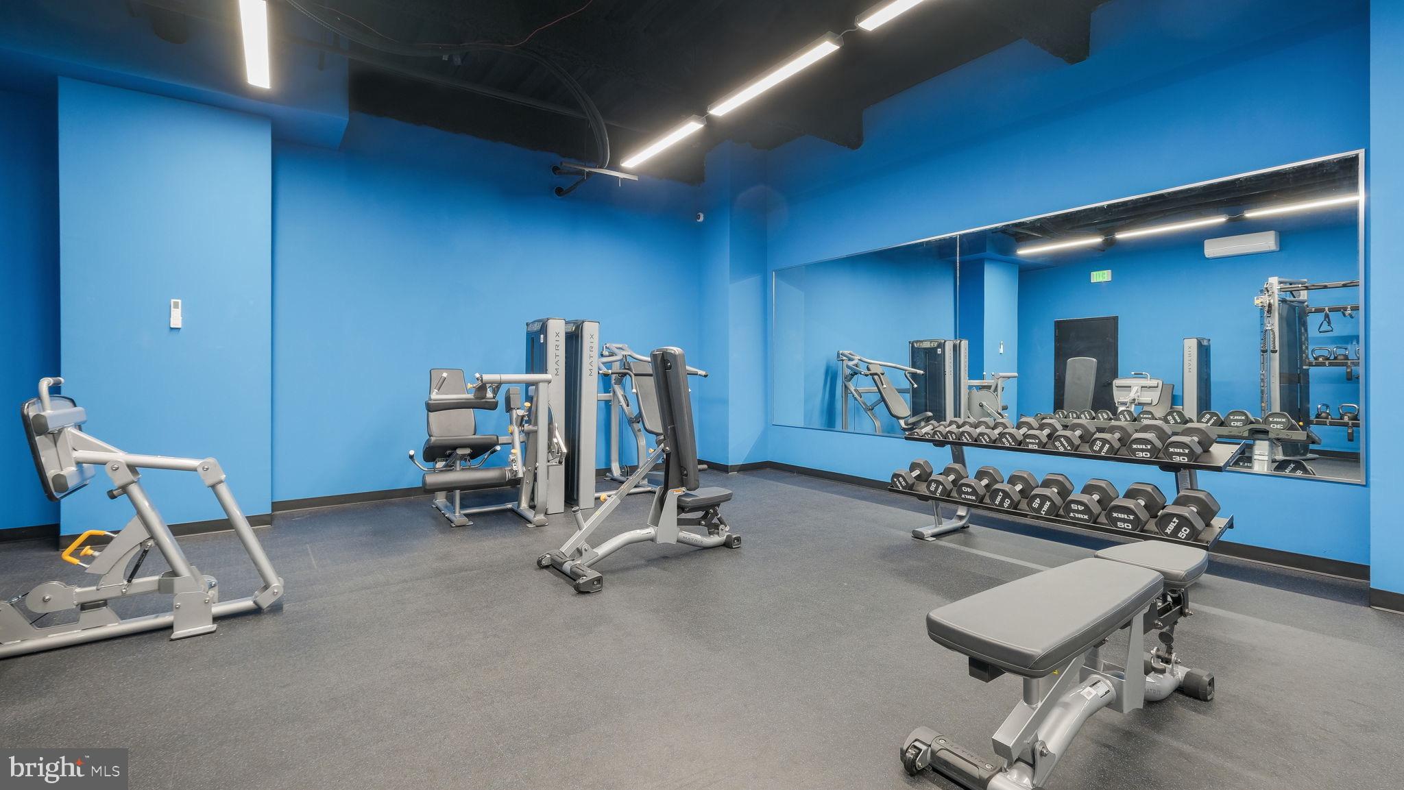1825 Callowhill Street, Unit 504 Philadelphia, PA 19130 - Photo 27 of 49 a view of a room with gym equipment