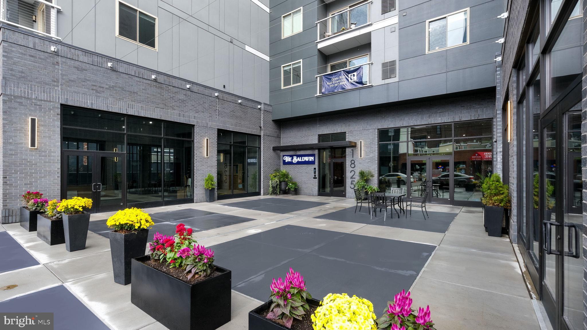 1825 Callowhill Street, Unit 504 Philadelphia, PA 19130 - Photo 39 of 49 a view of a building with sitting area