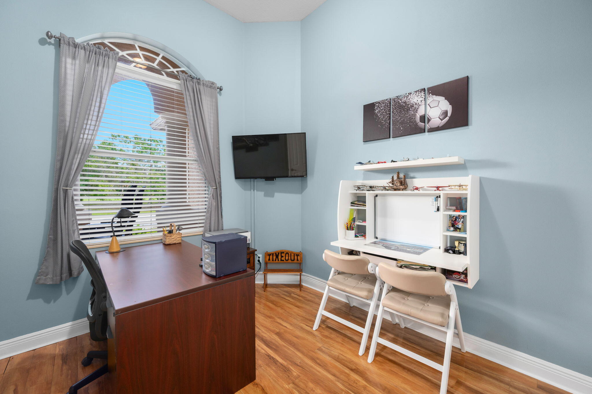 1438 Southwest Apache Avenue Port St. Lucie, FL 34953 - Photo 15 of 34 a workspace with furniture and window