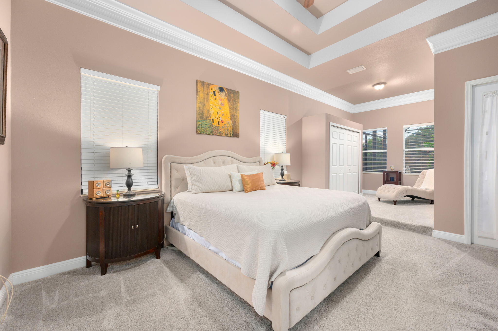 1438 Southwest Apache Avenue Port St. Lucie, FL 34953 - Photo 17 of 34 a bedroom with a bed and a large window