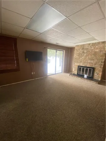 a view of a livingroom with a fireplace