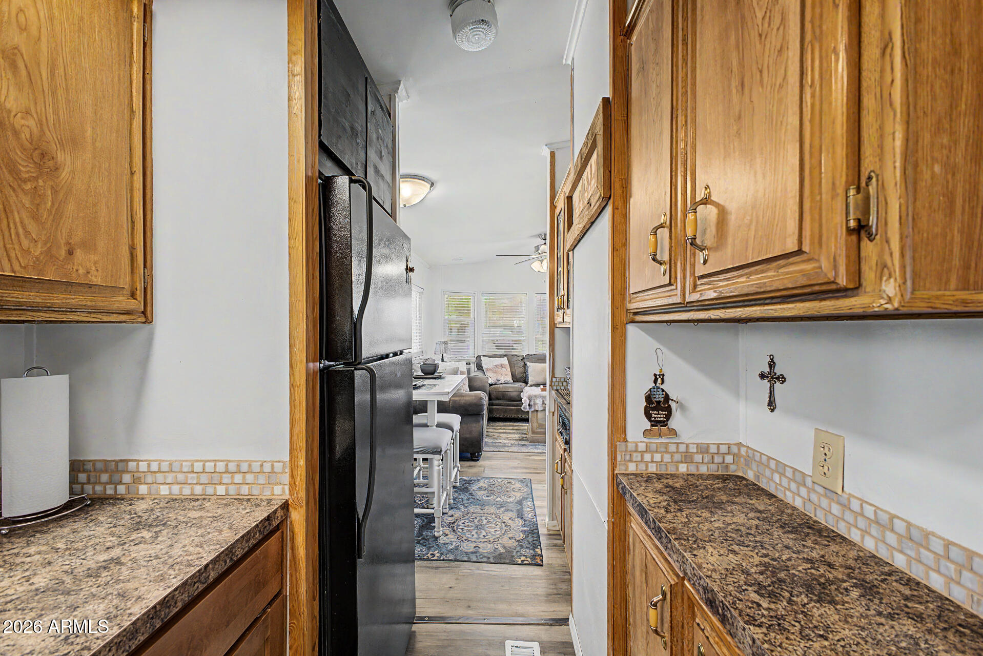 479 North Cactus Road Apache Junction, AZ 85119 - Photo 14 of 29 a kitchen with stainless steel appliances granite countertop a refrigerator and stove