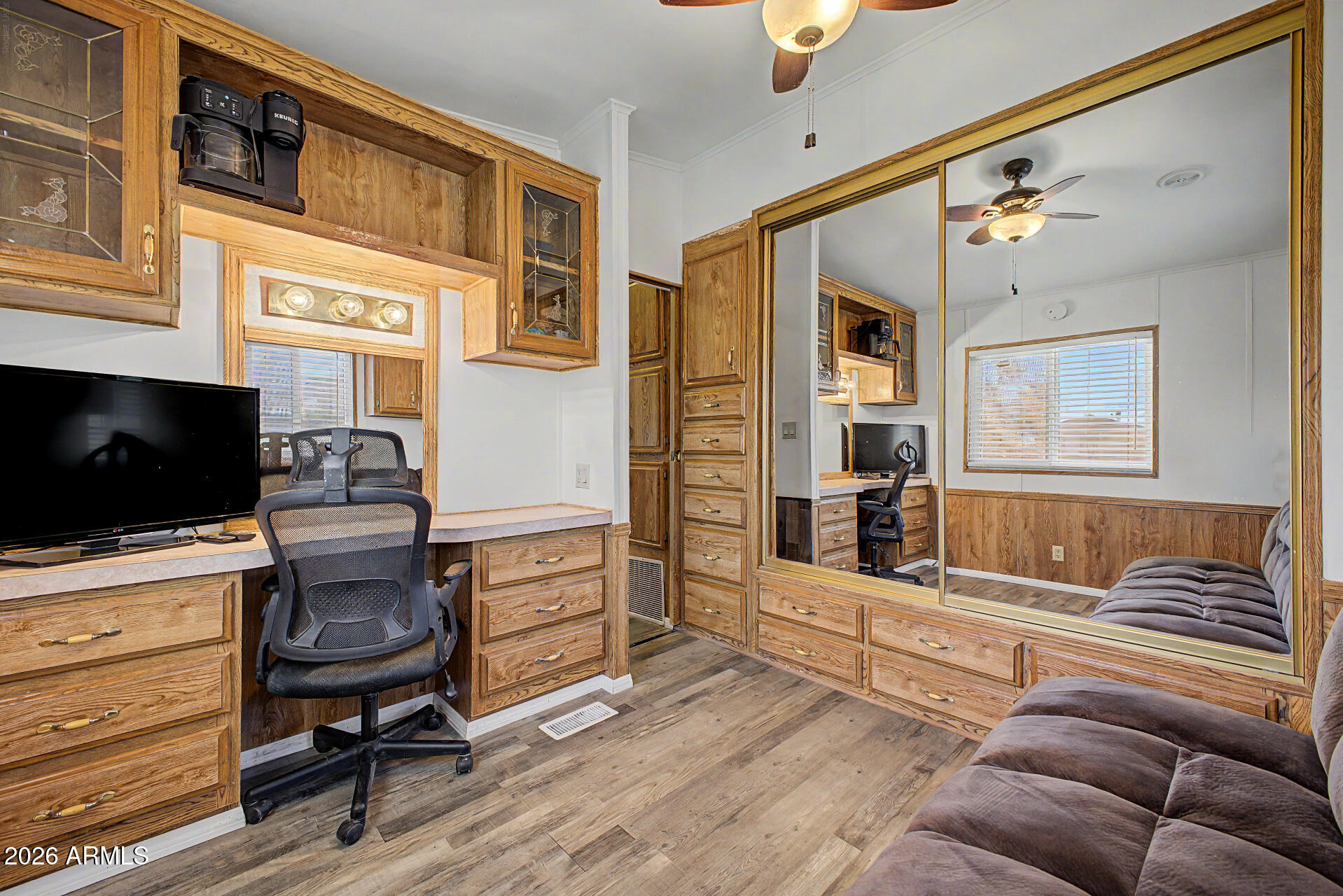 479 North Cactus Road Apache Junction, AZ 85119 - Photo 22 of 29 a living room with furniture and a flat screen tv
