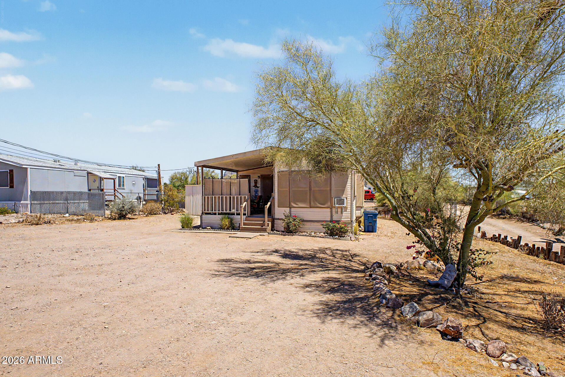 479 North Cactus Road Apache Junction, AZ 85119 - Photo 3 of 29 a view of a house with a yard covered in snow