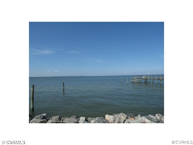 80 Riverside Drive Deltaville, VA 23043 - Photo 1 of 12 Exterior Front - Enjoy the tranquil views of the w