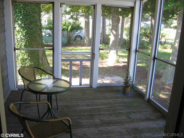80 Riverside Drive Deltaville, VA 23043 - Photo 11 of 12 Porch - Sit and relax on the screened porch and vi
