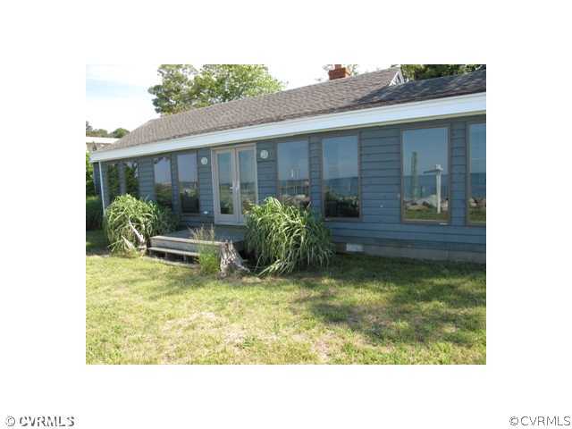 80 Riverside Drive Deltaville, VA 23043 - Photo 2 of 12 Exterior Front - The Sun Room fronts the bay and r