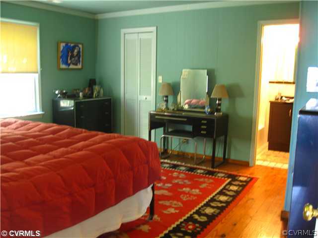 80 Riverside Drive Deltaville, VA 23043 - Photo 8 of 12 Master Bedroom - Offers large walk-in closet, addi