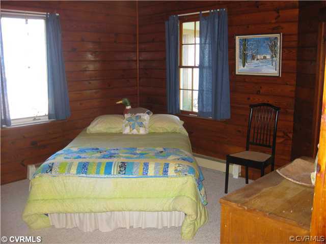 80 Riverside Drive Deltaville, VA 23043 - Photo 9 of 12 Bedroom - Bedroom 2 of 3 with corner closet, door