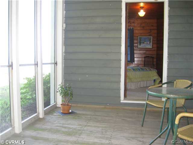 80 Riverside Drive Deltaville, VA 23043 - Photo 10 of 12 Porch - Screened porch overlooking river off bedro