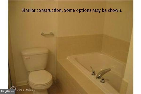 0 Mare Street Ranson, WV 25438 - Photo 6 of 18 a bathroom with a toilet and a shower