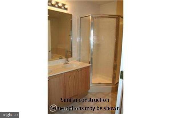 0 Mare Street Ranson, WV 25438 - Photo 7 of 18 a bathroom with a sink a mirror and a shower
