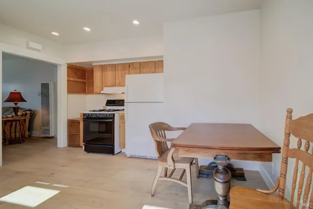 a view of a workspace with furniture