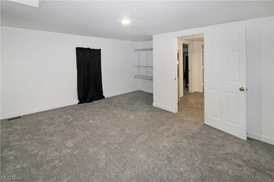 2148 Napoleon Road Fremont, OH 43420 - Photo 27 of 32 View of carpeted empty room