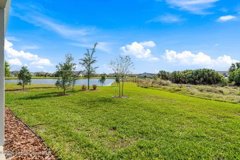 a view of a golf course with a lake