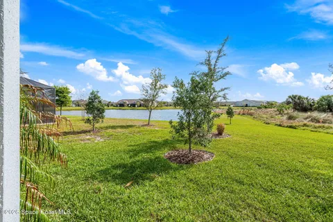 a view of a lake with a big yard