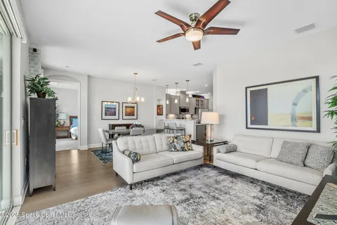 a living room with furniture and a rug