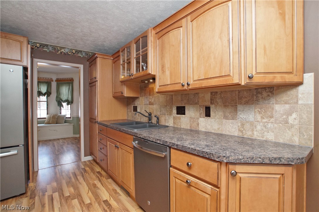 2776 Work Road Ravenna, OH 44266 - Photo 13 of 35 Beautiful tile backsplash and gorgeous maple cabinets.