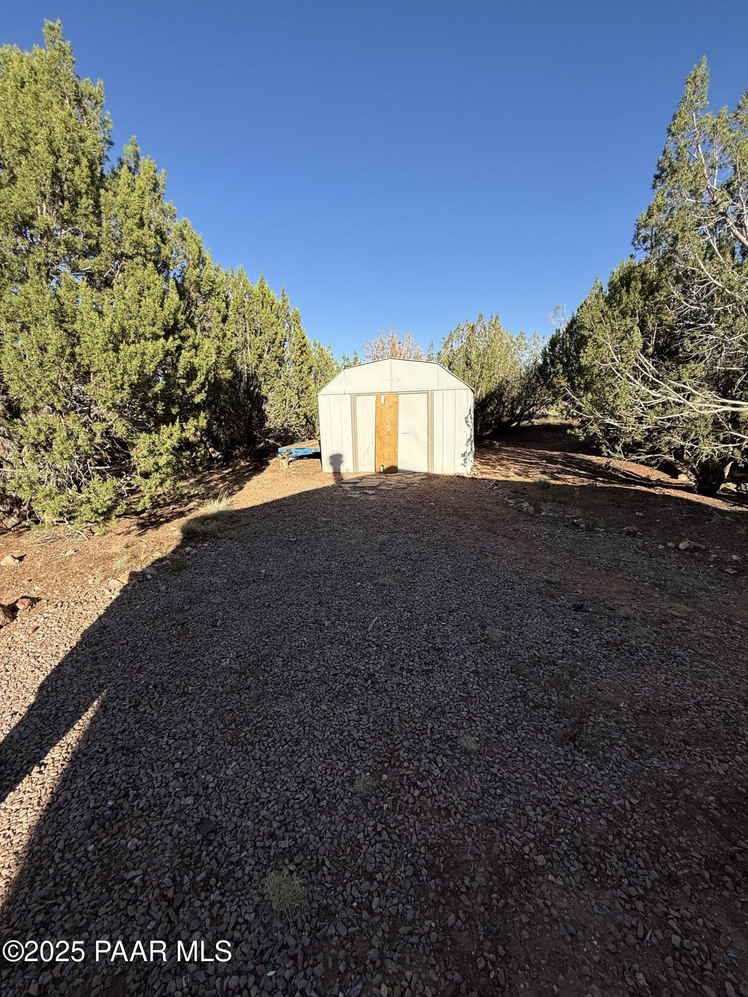58350 Rana Road Seligman, AZ 86337 - Photo 14 of 18 a view of a house with a yard