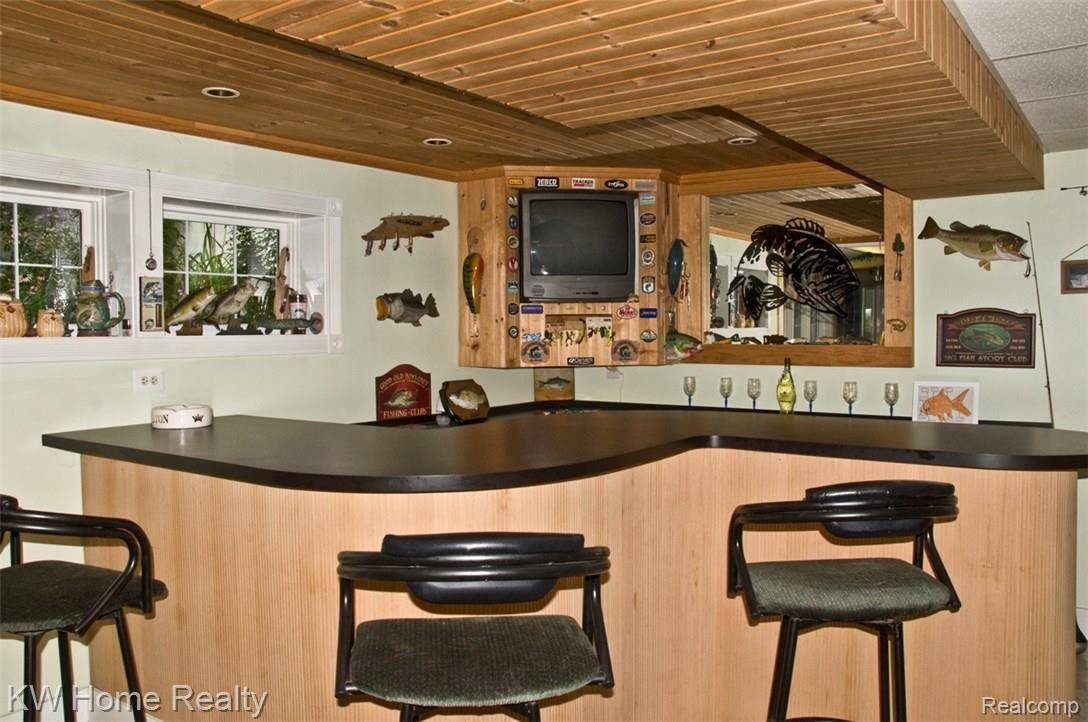 7755 Haley Road White Lake, MI 48383 - Photo 31 of 47 BAR IN BASEMENT