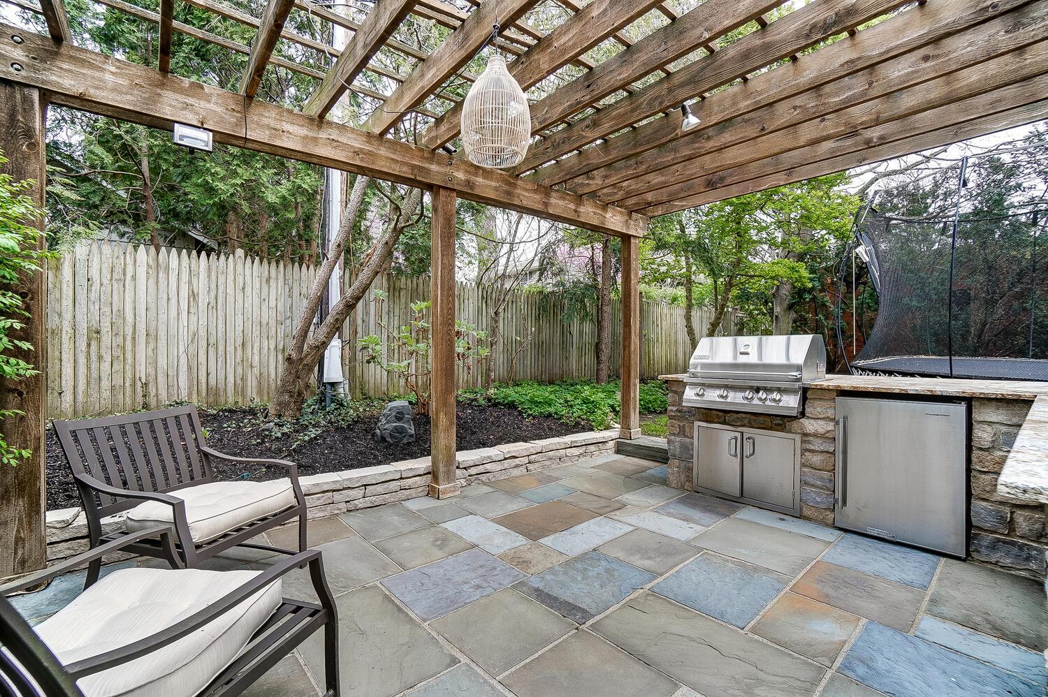 2252 Tremont Road Columbus, OH 43221 - Photo 86 of 97 Added outdoor kitchen, two- level patio and spacious backyard with mature landscaping