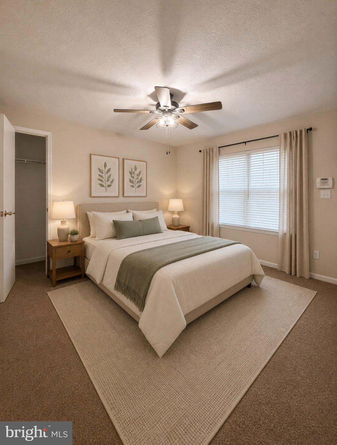 10510 Beacon Ridge Drive, Unit 14202 Bowie, MD 20721 - Photo 6 of 17 Serene bedroom with natural accents.
