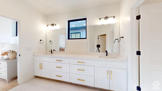 683 North Heritage Street Mapleton, UT 84664 - Photo 14 of 40 Bathroom with double vanity and marble finish flooring