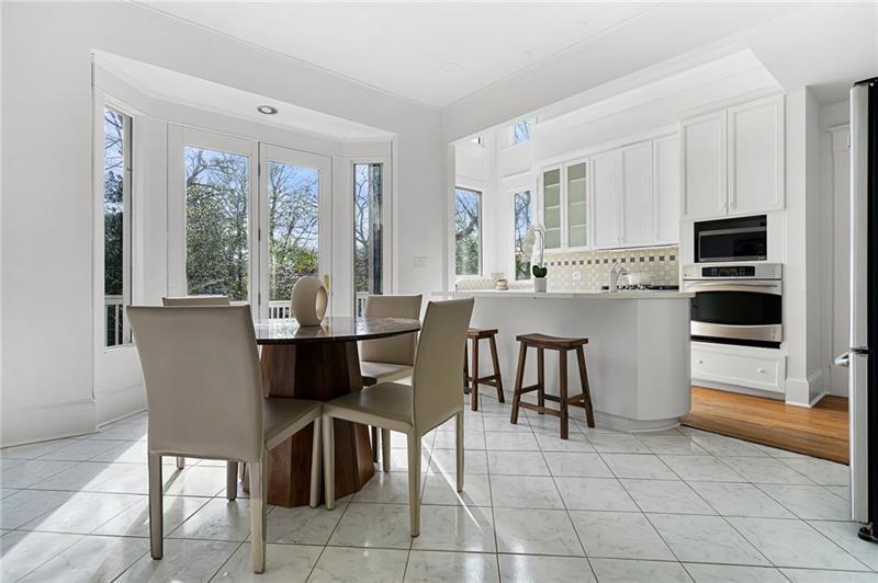 993 Highland View Northeast Atlanta, GA 30306 - Photo 13 of 54 a view of a dining room with furniture window and outside view