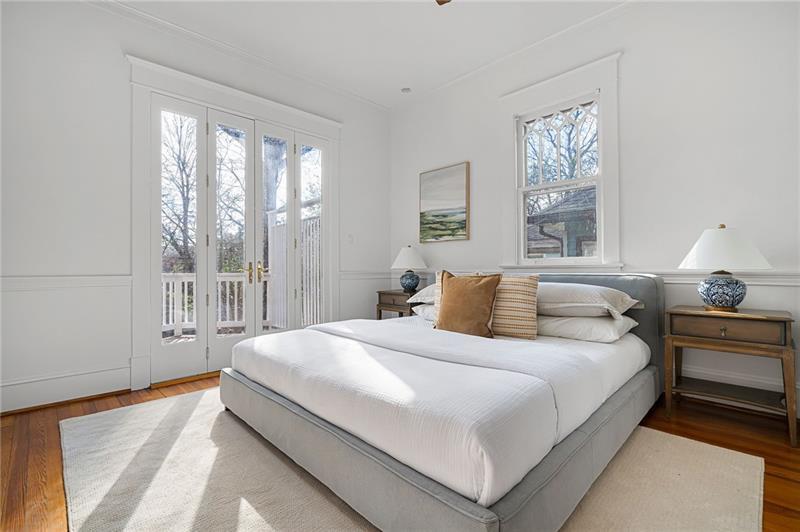 993 Highland View Northeast Atlanta, GA 30306 - Photo 16 of 54 a bedroom with a large bed and a large window