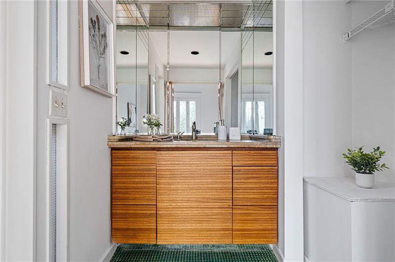 993 Highland View Northeast Atlanta, GA 30306 - Photo 18 of 54 a bathroom with a sink and a mirror