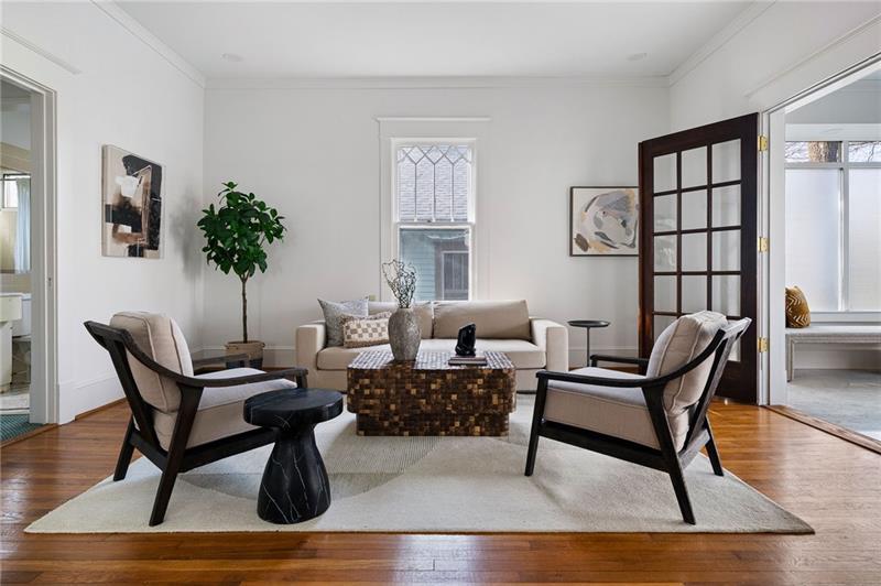 993 Highland View Northeast Atlanta, GA 30306 - Photo 3 of 54 a living room with furniture and a potted plant