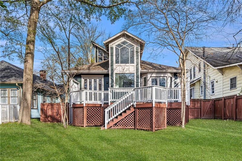 993 Highland View Northeast Atlanta, GA 30306 - Photo 31 of 54 a view of a house with a yard and deck