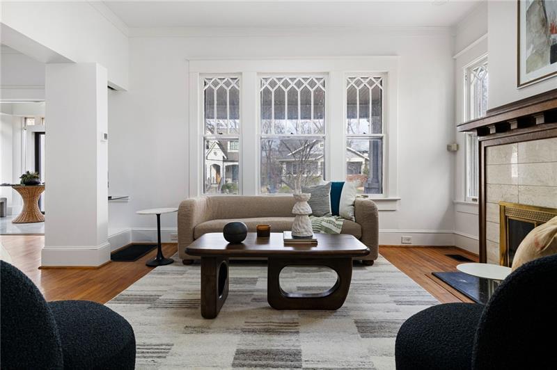 993 Highland View Northeast Atlanta, GA 30306 - Photo 6 of 54 a living room with furniture and a fireplace
