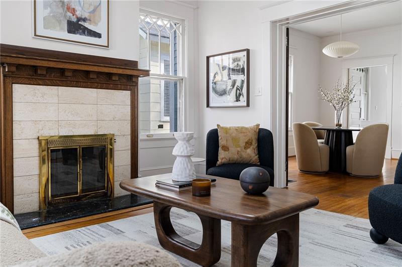 993 Highland View Northeast Atlanta, GA 30306 - Photo 7 of 54 a living room with furniture and a fireplace