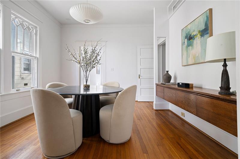 993 Highland View Northeast Atlanta, GA 30306 - Photo 9 of 54 a dining room with furniture and wooden floor