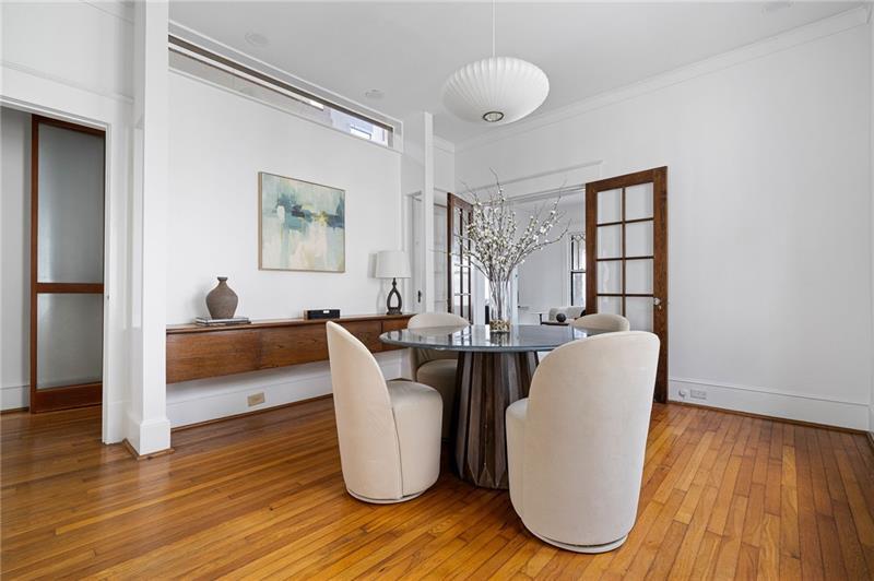 993 Highland View Northeast Atlanta, GA 30306 - Photo 10 of 54 a living room with furniture a window and wooden floor