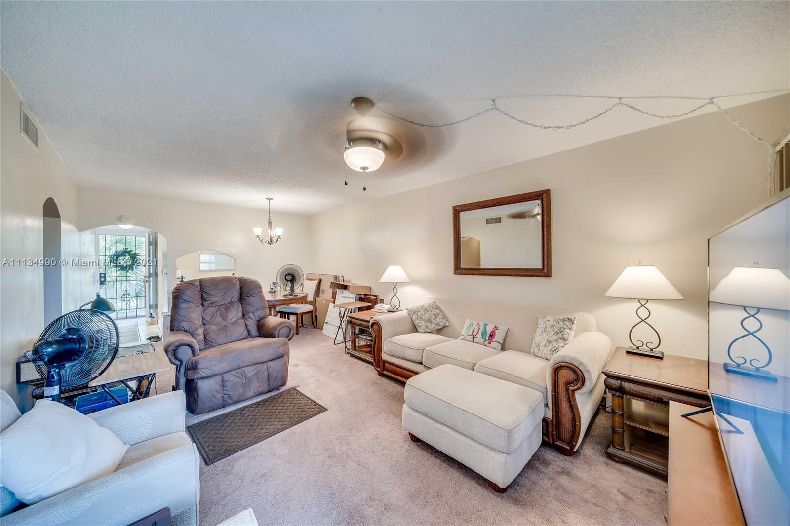469 North Pine Island Road, Unit B305 Plantation, FL 33324 - Photo 20 of 38 a living room with furniture
