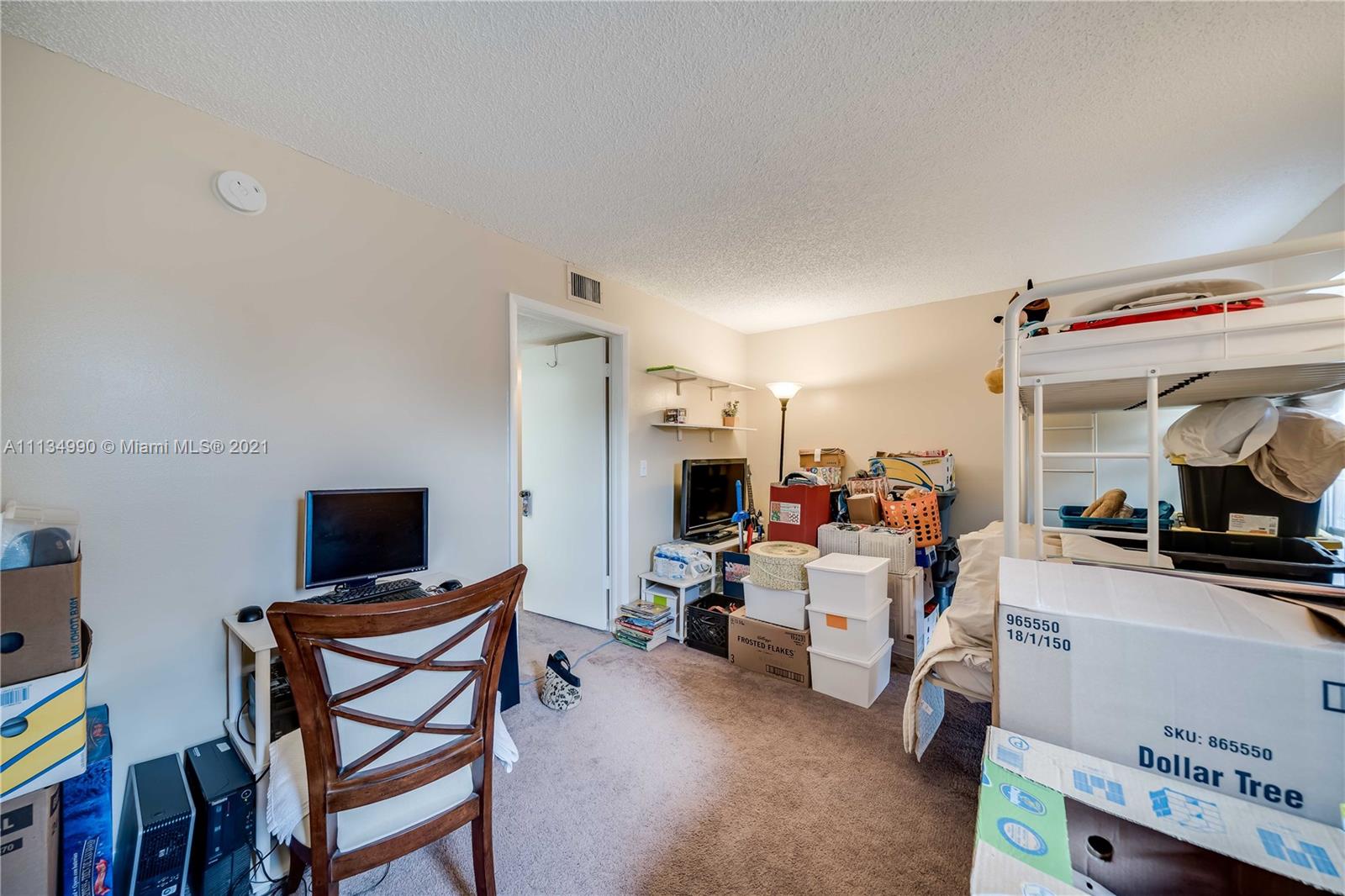 469 North Pine Island Road, Unit B305 Plantation, FL 33324 - Photo 29 of 38 a room with furniture and a flat screen tv