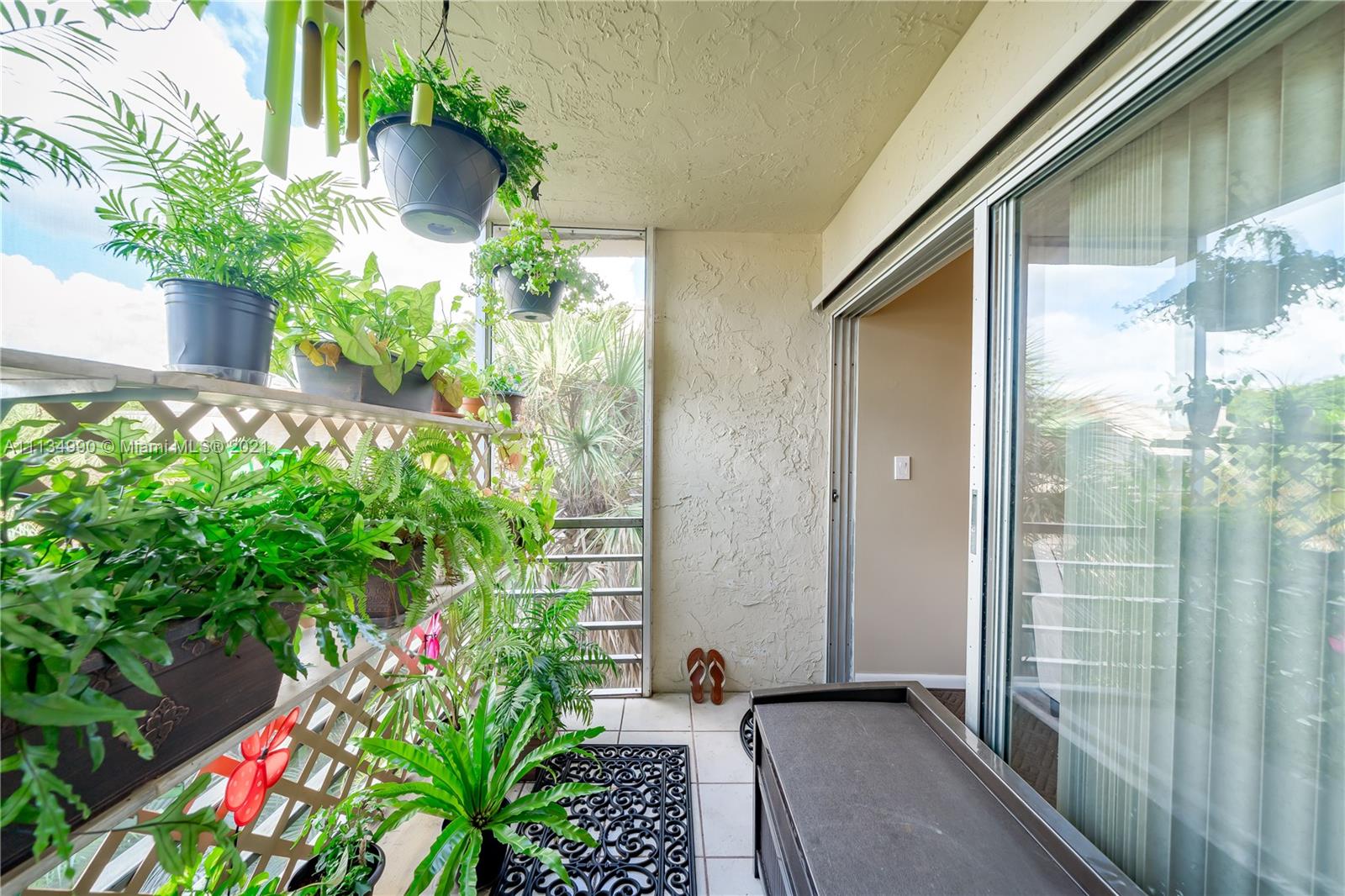 469 North Pine Island Road, Unit B305 Plantation, FL 33324 - Photo 35 of 38 a front view of a house with a yard