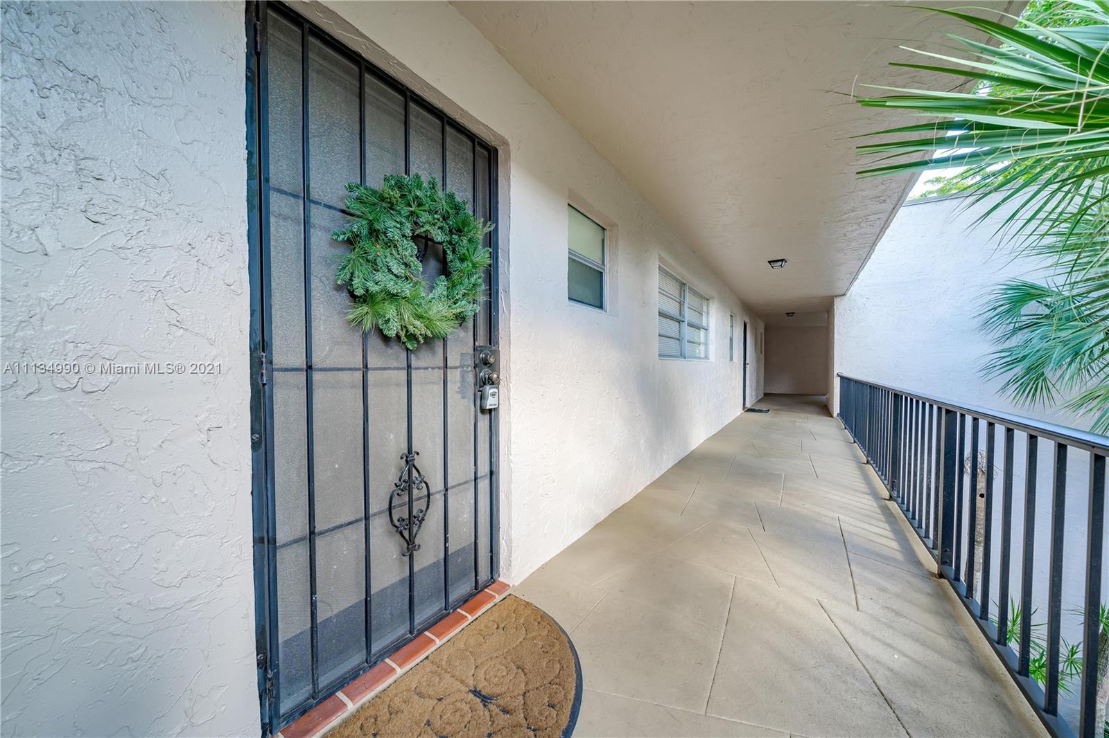 469 North Pine Island Road, Unit B305 Plantation, FL 33324 - Photo 9 of 38 a view of a hallway
