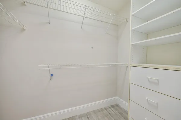 a view of a room with racks on the wall