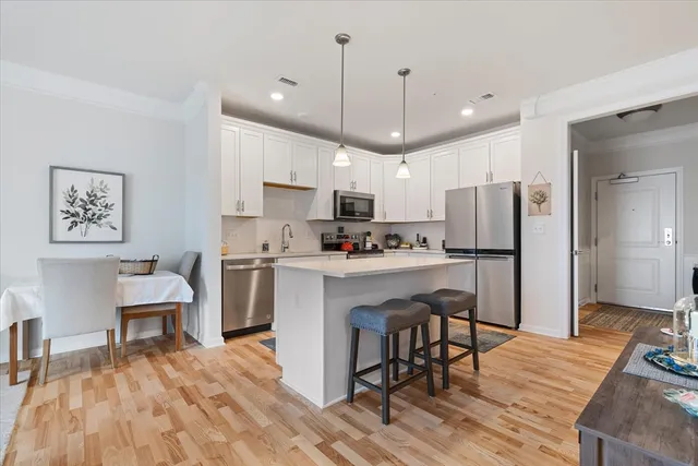 a bathroom with a shower curtain and a shower curtain