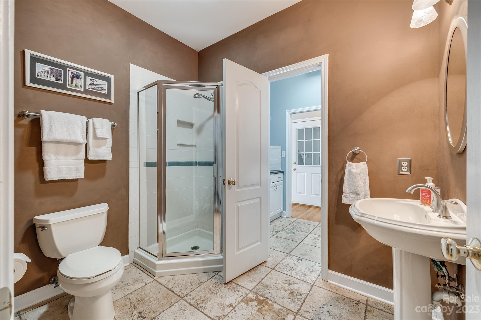 12005 Forest Garden Fort Mill, SC 29708 - Photo 20 of 48 a bathroom with a sink toilet and shower