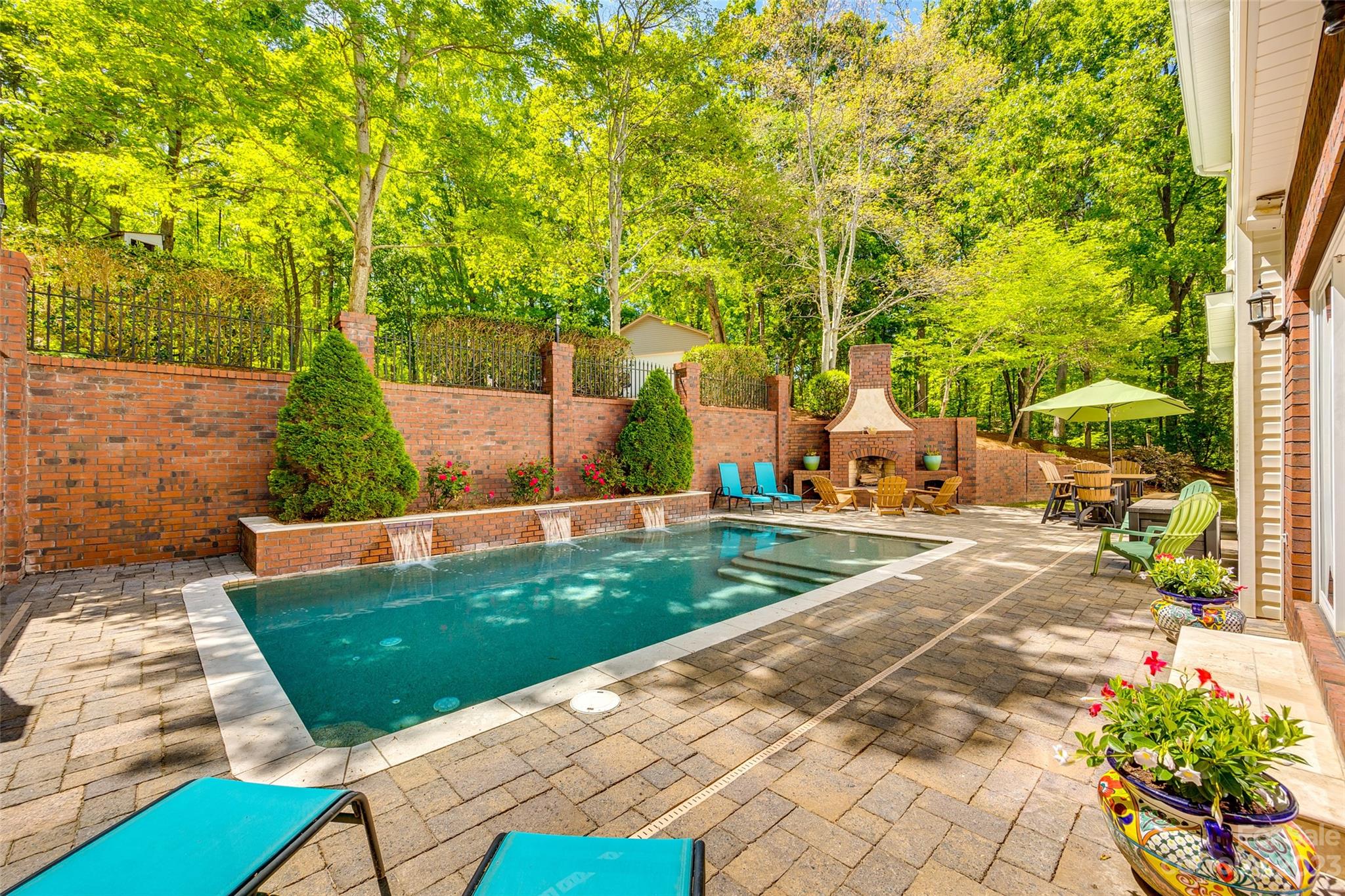 12005 Forest Garden Fort Mill, SC 29708 - Photo 2 of 48 a view of a backyard with sitting area