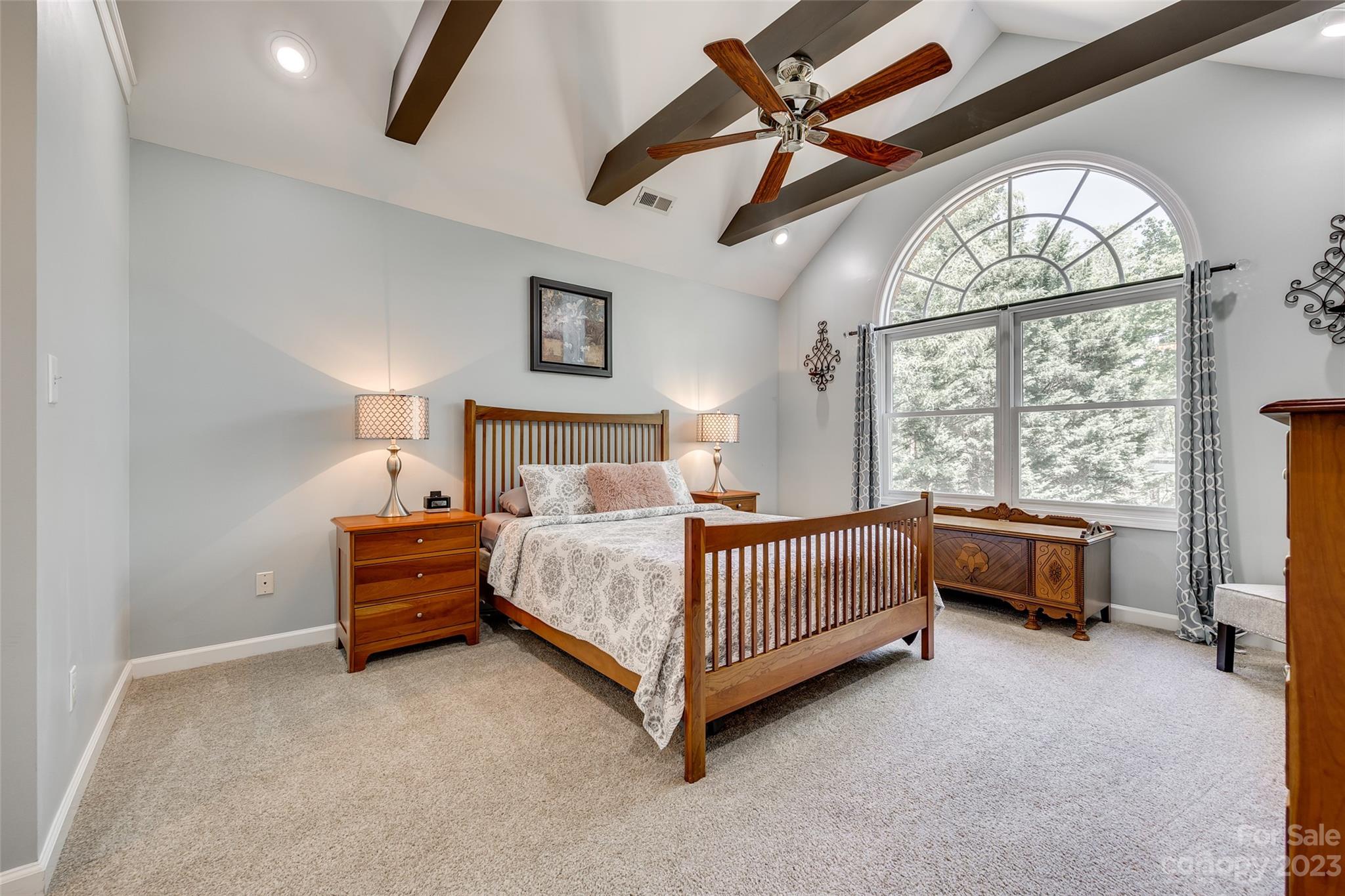 12005 Forest Garden Fort Mill, SC 29708 - Photo 25 of 48 a bed room with a bed and a chandelier