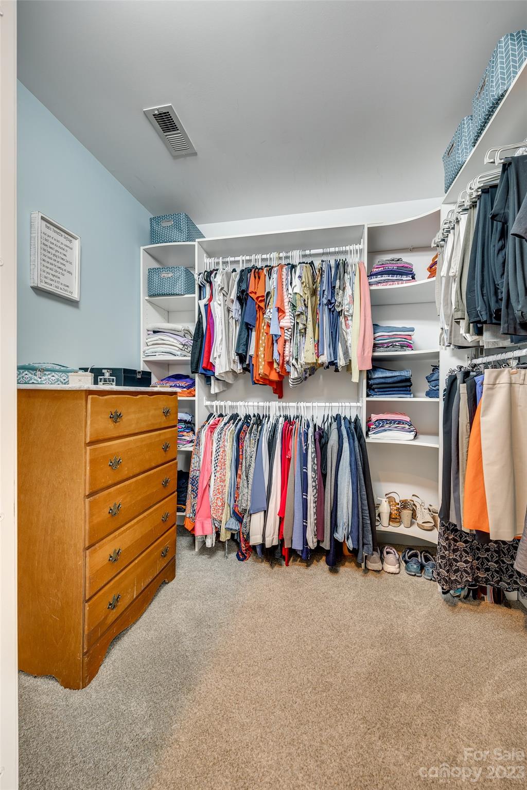 12005 Forest Garden Fort Mill, SC 29708 - Photo 28 of 48 a view of walk in closet with clothes