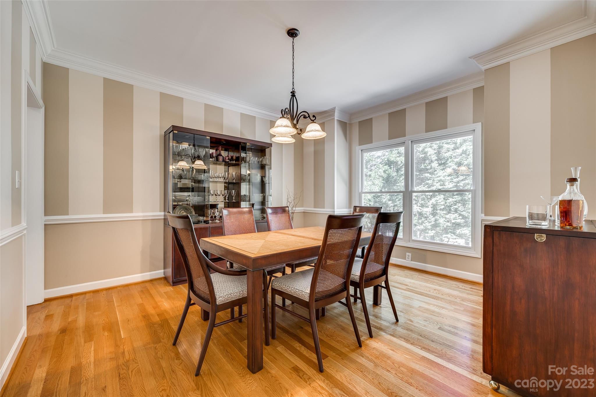 12005 Forest Garden Fort Mill, SC 29708 - Photo 9 of 48 a view of a dining room with furniture window and wooden floor
