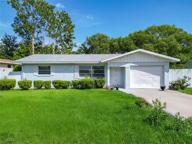 front view of a house and a yard